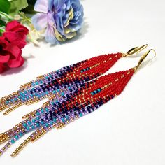 "Seed Bead Earrings 5 inch long.Flowing beads earrings.Bohemian dangle beaded earrings. with fringe are made of high quality Czech and Japanese seed beads. long earrings.Bead weaving techniques. Colors: Red. Turquoise ,Purple amethyst ,Dark purple and gold color. ! Details ! Made with quality Japanese and Czech seed beads ! Professional threads for weaving with beads Tytan and Fireline. ! Length 5 inches ( 13cm) ! Sterling gold metal ear wire. Simple sterling silver ear wire 925 are included wit Dangle Beaded Earrings, Earrings Bead, Goose Creek, Beaded Tassel Earrings, Long Tassel Earrings, Purple Turquoise, Beads Earrings, Native American Beading, Earrings Bohemian