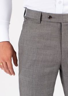 Our Spanish Grey Prince Of Wales pants are expertly tailored with a unique light grey, lightweight fabric that is sure to make a statement. Crafted by experienced artisans, the pants are made to ensure a perfect fit with superior comfort. A timeless color and style, these custom pants are the perfect way to upgrade your wardrobe. Gray Slim Fit Ankle-length Pants, Gray Slim Fit Ankle-length Bottoms, Gray Slim Fit Dress Pants With Tapered Leg, Gray Slim Fit Tapered Leg Dress Pants, Fitted Gray Business Pants, Gray Slim Fit Straight Pants, Fitted Gray Dress Pants With Pockets, Gray Fitted Pants For Business Casual, Fitted Gray Pants For Business Casual