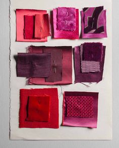 several different colored pieces of fabric on a piece of paper that has been cut into squares