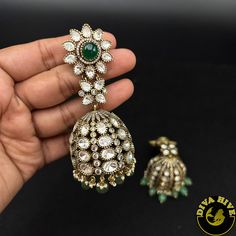 Dera Moissanite Jhumka - Earring -Diva Exclusive Green Tilla Jhumkas For Reception, Heavy Fusion Dangle Jhumkas, Green Fusion Earrings With Cutdana, Heavy Drop Jhumkas For Reception, Green Heavy Drop Jhumkas, Heavy Green Drop Jhumkas, Heavy Jhumkas For Reception, Heavy Green Drop Earrings Jhumkas, Green Jhumkas For Reception And Festivals