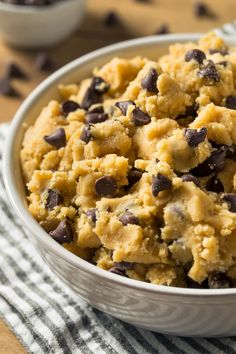 a bowl filled with cookies and chocolate chips