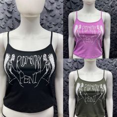 This is a Rudimentary Peni crop tank top with spaghetti straps. Available in three colors black, pink, and army green. sizes from a Small to XXL. This has a Rudimentary Peni image screen printed on the front. 57% cotton/ 38% polyester/ 5% Spandex These are handmade screen-printed and slightly vary from the photo. Please feel free to email me any questions. Thanks for looking. Due to an influx of incorrect addresses if a package is returned, you must pay the shipping cost to resend the item to yo Crop Tank Top, Three Color, Cropped Tank Top, Crop Tank, Army Green, Womens Clothing Tops, You Must, Spaghetti Strap, Spaghetti