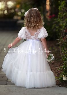 This amazing flower girl dress is as precious as it is beautiful. Created with an elegant vintage style in mind, dress features lace bodice with tulle and lace ruffle sleeves, complemented by a full tulle skirt with deep ruffle. Dress is perfect for weddings, flower girl, parties, portraits and special occasions. Dress is White Please include sash color in cart notes. Please use our "chat bubble" if you need assistance. Care: Hand wash, line or dry flat. Clothes steamer to remove wrinkles. Acces Bohemian Flower Girl Dress, Bohemian Flower Girl, Burgundy Flower Girl Dress, Flower Girl Dress Tulle, Rustic Flower Girl, Rustic Flower Girl Dress, Girl Parties, Chat Bubble, Boho Flower Girl