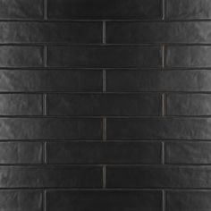 a black brick wall is shown in this image