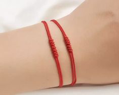 7 Knots Red String Bracelet Good Luck Amulet for Success and Prosperity. Includes 1 bracelet Red Round Bracelets For Meditation, Casual Red Jewelry With Sliding Knot, Casual Red Jewelry For Friendship, Casual Red Friendship Jewelry, Red Spiritual Bracelets For Friendship, Red Round Jewelry For Friendship, Round Red Jewelry For Friendship, Casual Red Jewelry For Gifting, Casual Red Jewelry For Gifts