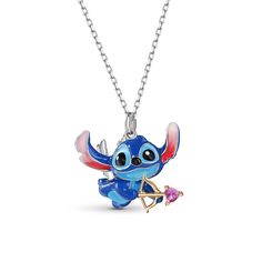 Featuring a beloved cartoon character, this necklace can be an eye-catching addition to most outfits. Crafted in sterling silver with red enamel ears, the adorable extraterrestrial holds a heart-shaped arrow. Be love-struck by extraterrestrial with this adorable necklace.Carat Weight: 0.145 ctStone Size: 3*3 mmStone Type: Jeulia® StoneNumber of Stones: 1 Stone Color: FuchsiaStone Shape: HeartWeight: 4 gWidth: 22.4 mmHeight: 18.5 mmThickness: 8.2 mmMaterial: 925 SilverPlating Color: Silver, Yello Playful Jewelry With Adjustable Chain For Gifts, Disney Sterling Silver Jewelry In Silver, Disney Style Sterling Silver Jewelry Gift, Disney Personalized Necklaces For Gifts, Playful Silver Necklaces With Charms, Disney Jewelry For Valentine's Day Gift, Disney Style Jewelry For Valentine's Day Gift, Themed Sterling Silver Charm Necklaces, Silver Disney Charms Jewelry