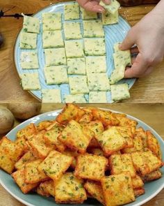 there is a plate full of tofu and some potatoes on the table next to it