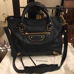 Nwt Balenciaga Velo Large Shoulder Bag Dark Blue Never Used Has Removable Shoulder Strap Inside 3 Pockets One With Zipper 100% Authentic Dust Bag Included 10.5x8 Shoulder Drop 16” Leather Designer Satchel With Gold-tone Hardware For Daily Use, Designer Satchel With Gold-tone Hardware For Travel, High-end Shoulder Bag With Branded Hardware For Everyday Use, Designer Shoulder Bag With Branded Hardware For Everyday, Luxury Satchel With Branded Hardware For Everyday Use, Designer Satchel With Branded Hardware For Everyday Use, Balenciaga 2015, Balenciaga Velo, Balenciaga Mini City Bag