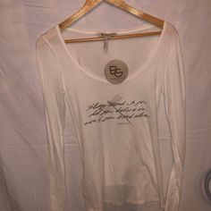 Bcbg Chandie “Tissue” Top Jersey In White With Silver Wording “Always Stand Up For What You Believe In, Even If You Stand Alone” With A Dragonfly Detail. 100% Cotton. Size Medium. Chic Text Print Tops For Spring, Crushed Velvet Top, Striped Long Sleeve Tee, Ruched Top, Black Long Sleeve Shirt, Long Sleeve Striped Top, Turtle Neck Top, Velvet Tops, Green Blouse