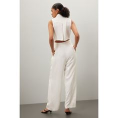 White (Main 85% Viscose, 15% Linen. Lining 100% Viscose). Jumpsuit. Sleeveless. Collared. Front button closure. See size & fit notes for length and measurements. 30" inseam. 13" rise. 8" leg opening. Imported. Sleeveless Summer Pantsuit For Formal Occasions, Sleeveless Summer Formal Pantsuit, Sleeveless Pantsuit For Summer Formal Occasions, Sleeveless Pantsuit For Formal Summer Events, Sleeveless Formal Summer Pantsuit, Sleeveless Fitted Spring Pantsuit, Tailored Sleeveless Spring Pantsuit, Fitted Sleeveless Spring Pantsuit, Fitted Sleeveless Pantsuit For Spring