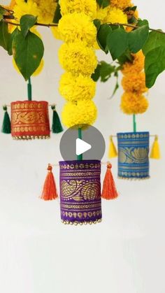 the video is showing how to make colorful flower vases with paper flowers and tassels