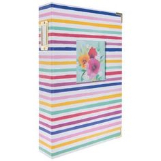 a multicolored striped binder with flowers on it