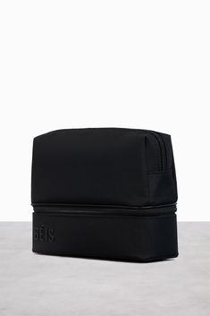 a black bag sitting on top of a table