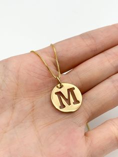 Gold Letter M Pendant made of Gold Vermeil: 18k Gold over Solid 925 Sterling Silver ☞ made to last.Matching Ring & Earrings ☞ please ask meDetails:• Letter M Pendant in Gold Vermeil• Dimensions: Pendant Height 20mm, Width 15mm• Free Complimentary Chain• 18k Gold VermeilSKU PE010490210 Yellow Gold Initial Pendant With Hallmarks, Gold Initials Jewelry As A Gift For Mom, 14k Gold Initials Jewelry For Mother's Day, 14k Gold Jewelry With Initials For Mother's Day, 14k Gold Initial Pendant Jewelry For Mom, 14k Gold Initial Pendant Jewelry Gift For Mom, Yellow Gold Initials Jewelry For Mom, 14k Gold Round Jewelry Gift For Mom, Yellow Gold Jewelry With Hallmarks For Mom