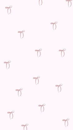 a pink wallpaper with scissors and hair clips on it's sides, all lined up in the same pattern