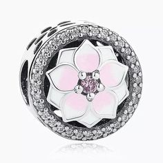 This gorgeous charm has a pink and white enamel magnolia flower with a lovely pink cz crystal in the center. It is a stunning charm! Makes a lovely addition to your charm bracelet or as a gift for someone special. You can also place this bead on a chain for a simple, yet stunning necklace. This charm will fit all top brand charm bracelets including brands such as Pandora and Chamilia. It will also fit 3mm European snake chain charm bracelets. Hole Size: 4mm Charm Size: 12mm Listing is for bead o Pink Pandora Charm, Pink Flower-shaped Cubic Zirconia Jewelry, Sterling Silver Jewelry With Pink Flower Charm, Silver Flower Charms Jewelry, Pink Sterling Silver Flower Pendant Jewelry, Pink Flower Pendant Jewelry In Sterling Silver, Pink Sterling Silver Flower-shaped Jewelry, Pink Sterling Silver Charms For Mother's Day, Pink Sterling Silver Charms For Gifts