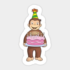 a monkey holding a birthday cake with candles on it