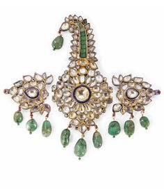 A GEMSET ENAMELLED GOLD TURBAN ORNAMENT (SARPECH) JAIPUR, NORTH INDIA, 19TH CENTURY Of typical form with a central curved palmette rising from a central rosette, flanked by two triangular palmettes, with emerald beads hanging, the reverse enamelled, the side palmettes now separate, each mounted as a broach, in leather box 4¾in. (12.3cm.) high Rajasthan Jewellery, Rajput Jewellery, Bridal Jewels, Beautiful Tiaras, Traditional Jewellery