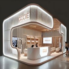 an exhibition stand with people standing around it