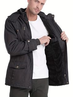 Black Fall Parka With Cargo Pockets, Black Outerwear With Cargo Pockets For Outdoor, Fall Black Parka With Cargo Pockets, Black Outdoor Outerwear With Cargo Pockets, Black Hooded Jacket With Cargo Pockets For Winter, Black Hooded Jacket With Cargo Pockets For Fall, Fall Black Hooded Jacket With Cargo Pockets, Winter Fleece Jacket With Pockets For Outdoor Activities, Winter Outdoor Windbreaker With Flap Pockets