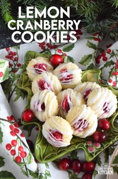 lemon cranberry cookies on a plate with holly leaves