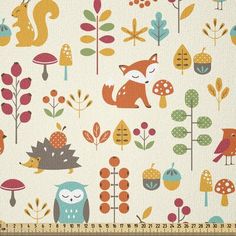 an image of a fabric with animals and trees on the back in orange, green, blue