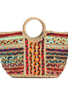 Expertly crafted in India, the Speralla Jute Tote is a natural and colorful handbag with a sturdy wooden handle. Its large size makes it perfect for carrying all your essentials while adding a touch of style to any outfit. Made from jute, this tote is not only fashionable but also environmentally friendly. Each bag is handmade and may be slightly different. 8 W x 19.5 L x 12 H This style is sold online only. Colorful Handbag, Jute Totes, Colorful Handbags, Boutique Items, Wooden Handles, Selling Online, Environmentally Friendly, Large Size, Fashion Forward