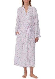 This soft cotton modal ballet wrap robe is designed with a sweet pink rose print. Delicate lace trims the neck band. It is finished with angled ruffle cuffs, a set-in belt and two in-seam pockets. | Eileen West Women's Cotton Modal Pointelle Long Sleeve Robe, L-XL Fitted Spring Daywear Robe, Fitted Robe For Spring Daywear, Fitted Spring Sleepwear For Home, Feminine Fitted Sleepwear, Feminine Fitted Sleepwear For Relaxation, Feminine Fitted Daywear Robe, Feminine Fitted Robe For Daywear, Fitted Lace Trim Robe For Spring, Fitted Feminine Daywear Robe