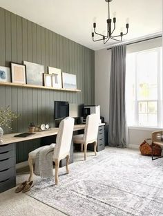 a living room filled with furniture next to a window and a rug on the floor