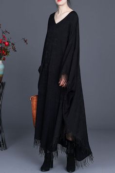 #fringes #cape #dress #plussize #linen Long Maxi Dress With Tassels, Long Sleeve Kaftan With Back Tassel Tie-up, Long Dresses With Tassel Ties, Black Maxi Dress With Tassels, Long Sleeve Spring Kaftan With Tassels, Spring Long Kaftan With Fringe, Long Sleeve Kaftan With Tassels For Spring, Plus Size Caftan, Linen Plus Size