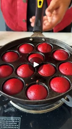 a person is cooking some food in a frying pan