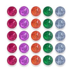 many different colored glittered buttons on a white background