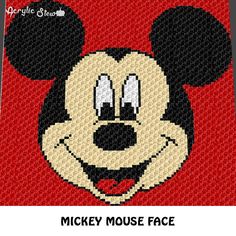 a close up of a mickey mouse face on a red background