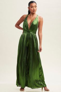 Be the day's style star in this eye-catching, moss green metallic jumpsuit. Featuring a pleated design and tie-back for a chic fit, you'll be sure to make a statement! Get ready to sparkle and shine! Pleated Fitted Jumpsuits And Rompers For Party, Glamorous Summer Gala Jumpsuits And Rompers, Chic Green Jumpsuits And Rompers For Night Out, Chic Pleated Evening Jumpsuits And Rompers, Chic Pleated Jumpsuits And Rompers For Evening, Elegant Green Backless Jumpsuit, Elegant Green Backless Jumpsuits And Rompers, Sleeveless Pleated Party Jumpsuits And Rompers, Metallic Shimmer Jumpsuits And Rompers For Party