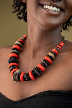 Unique Africa Maasai Handcrafted Leather Beaded Necklace with an Elegant Look and Brilliant Finish. Color = Orange, Brown, and Black. Length (Around Neck) =20 Inches. **GET FREE SHIPPING FOR ADDITIONAL ITEMS PURCHASED. Yes, Buy Multiple Items and pay shipping for 1 item only- The rest ships Free. (No Limits on the number of Multiple items). With a faster delivery time of 3 days via DHLExpress, Worldwide. Ordinary/Standard Shipping also available upon request. We Custom Make to Suit Your Taste. A Unique Orange Jewelry With Wooden Beads, Unique Orange Necklace With Wooden Beads, Orange Wooden Beads For Jewelry Making, Unique Orange Necklace With Large Beads, Adjustable Orange Necklace With Wooden Beads, Adjustable Orange Artisan Necklace, Artisan Adjustable Orange Necklace, Artisan Orange Jewelry With Wooden Beads, Artisan Orange Adjustable Necklace