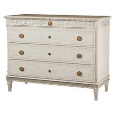 an old white dresser with gold knobs on the top and bottom drawers, against a white background