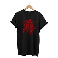 "This is a occult t-shirt for a gothic style. This gothic shirt suits a dark aesthetic outfit. This goth tee is a perfect gift for Edgy men, Emo women, E-girl, E-boy, witches, goth girls and goth boys, dark teen girls and teen boys. Do you prefer a different color print or color t-shirt? No problem, send me a message with your request so i can confirm and print it as YOU like. Do you want one of the prints on hoodies, kids sizes or a specific garment? just contact me and i will contact you back Edgy Red Graphic Print T-shirt, Red Punk T-shirt For Streetwear, Punk Style Pre-shrunk Short Sleeve Shirt, Emo Black T-shirt With Graphic Design, Gothic Short Sleeve T-shirt With Skull Print, Punk Style T-shirt With Screen Print For Alternative Fashion, Punk Halloween Anime Print Top, Halloween Punk Anime Print Tops, Punk Anime Print Halloween Top