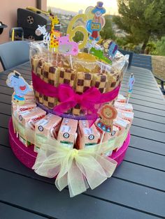 a birthday cake made out of cookies and candy