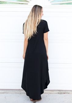 Looking for the perfect dress that's both comfortable and stylish? Look no further than our Relaxed Maxi Dress! This dress is the ultimate combination of comfort and fashion, with a loose, relaxed fit that flatters all body types. Whether you're running errands or headed out for a night on the town, this dress is versatile enough to suit any occasion. Dress it down with a denim jacket and sneakers or dress it up with some statement jewelry and heels. You'll love how easy it is to style this dres Casual Flowy Maxi Dress For Daywear, Casual Spring Maxi Dress With Side Slits, Casual Short Sleeve Maxi Dress For Fall, Casual Relaxed Fit Maxi Dress, Casual Relaxed Fit Solid Color Maxi Dress, Casual Solid Color Maxi Dress With Relaxed Fit, Casual Solid Maxi Dress With Asymmetrical Hem, Casual Solid Maxi Dress For Day Out, Casual Relaxed Fit Maxi Dress For Loungewear