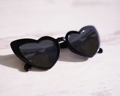 Add an elegant touch to your celebration with heart-shaped lenses of Set of 6 Heart Sunglasses. These charming accessories will protect from sun while adding a whimsical atmosphere to your special day, making it a memorable experience for your guests. Feature These heart sunglasses come in various colors like black, white, rose gold, and tortoise. Each pair is engraved with "Bride" and "Babe" on the temples, making it a unique and memorable gift for the bride and her bridesmaids. Heart sunglasse Bride And Her Bridesmaids, Custom Ring Box, Bachelorette Party Favor, Brides Babes, Bride And Bridesmaids, Gift For The Bride, Heart Sunglasses, Wedding Ring Box, Bachelorette Party Favors