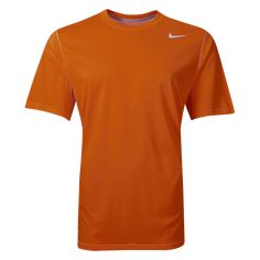 Nike Legend Poly Top. Train with the Swoosh and feel the difference. Dri-FIT training top looks like a tee but performs like a training jersey. Lightweight, moisture wicking training top with screened Nike logo. 100% polyester. Tennis Uniforms, Nike Short, Training Tops, Nike Mens, Workout Tee, Nike Logo, Dri Fit, Nike Men, Short Sleeve Tee