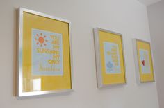 three framed pictures hang on the wall next to each other, one with a poem