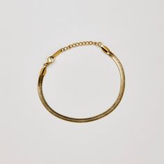 Bringing it back to basics with this everyday piece. Our Herringbone Bracelet is the perfect addition to any outfit. Get matchy-matchy with our Herringbone Necklace. 4mm 16 cm + 3cm Extension Stainless Steel & Gold Plated Tarnish & Water Resistant Hypoallergenic Adjustable Snake Chain Bracelet For Everyday, Metal Snake Chain Bracelets For Everyday, Metal Bracelets With Snake Chain For Everyday Wear, Everyday Metal Snake Chain Bracelets, Everyday Metal Snake Chain Bracelet, Dainty Everyday Snake Chain Bracelets, Adjustable Snake Chain Gold Bracelet For Everyday, Herringbone Bracelet, Herringbone Necklace