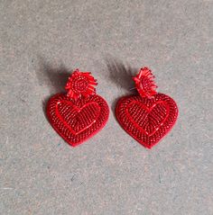 Handmade beaded blood red elegant heart earrings by Carnation Jewellery.  These stunning red❤️ stud earrings are perfect for any party or special occasion or pair these to your Valentines day, adding a touch of sophistication to any outfit. Each intricate bead is carefully woven into the shape of a delicate heart, making these earrings a truly unique and one-of-a-kind accessory.  Size : Approx. 2.50" long and 1.90" wide. At Carnation jewellery, each piece is designed and handcrafted in house by Carnation Jewelry, Red Earrings Stud, Red Heart Earrings, Red Studs, Party Earrings, Earrings Red, Blood Red, Christmas Earrings, Jewelry Earrings Hoops