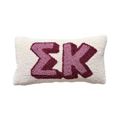 a pillow with the letter k on it