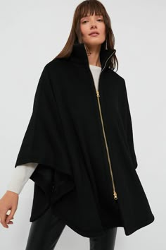 Oversized Funnel Neck Outerwear For Layering, Black Wool Poncho For Fall, Wool Black Poncho For Fall, Oversized Funnel Neck Outerwear For Cold Weather, Wool Outerwear With Funnel Neck For Fall, Oversized Winter Outerwear With Asymmetrical Zip, Wool Cape For Cold Weather, Oversized Funnel Neck Outerwear For Fall, Fall Funnel Neck Outerwear For Layering