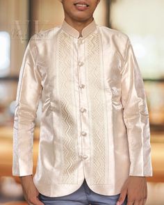 Experience the ultimate in comfort and style with our exquisite Gazar fabric coat barong, expertly crafted with layers of luxurious fabric to provide a thick and high-quality finish.  Details: Fabric: Metallic Gazar with lining and shoulder pads Color: Shade of Beige Collar: Chinese Collar  Design: Zigzag  Shipping:  We ship all our items directly from the Philippines using DHL to ensure fast and reliable shipping worldwide. To complete your shipping details, we kindly request that you provide u Elegant Beige Outerwear For Festive Season, Elegant Festive Beige Outerwear, Ceremonial Long Sleeve Cream Kurta, Traditional Cream Outerwear For Festive Season, Ceremonial Cream Long Sleeve Kurta, Cream Long Sleeve Nehru Jacket For Festive Occasions, Beige Formal Outerwear For Festive Occasions, Festive Formal Beige Outerwear, Fitted Beige Outerwear For Festive Season