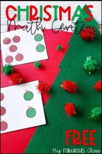 christmas math center with pom poms on the floor and free printables