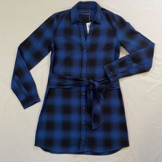 Nwt Abercrombie And Fitch Blue Black Check Flannel Dress. 100% Super Soft Cotton V Neck Button Down Front With Attached Flannel Cloth Tie Waist Approximate Lay Flat Measurements: Top Shoulder To Bottom Hem 33.5" Armpit To Armpit 18" Black Long Sleeve Plaid Dress, Plaid Midi Dress For Work, Plaid Office Dress, Long Sleeve Plaid Dress For Work, Casual Plaid Midi Dress For Work, Chic Knee-length Plaid Dress For Fall, Elegant Long Sleeve Plaid Dress For Work, Plaid Dress For Office, Long Sleeve Plaid Dress For Daywear