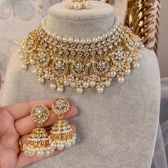 Gold Choker set with matching Jhumka earrings and tikka. A light weight choker adorned with faux kundan gems and beadwork. Choker is flexible to fit any size and is 2.5 inch in depth. Matching earrings 2 inch length. Small tikka 1.75 inch pendant with 3 inch hair chain  Delivery 6 Weeks from Order with gift boxing as standard! Small Tikka, Gold Choker Set, Kundan Choker Set, Bridal Jewelry Sets Brides, Pakistani Bridal Jewelry, Hair Chain, Indian Wedding Jewelry Sets, Neck Pieces Jewelry